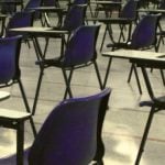 Chairs and desks at an SAT testing center.