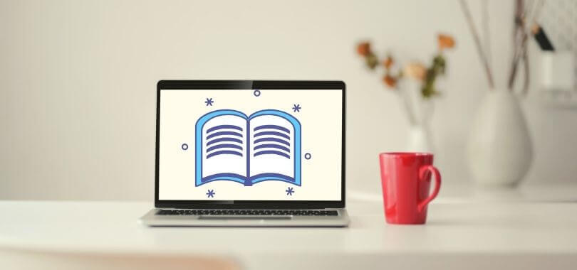 A college student's laptop with a book icon for online classes.