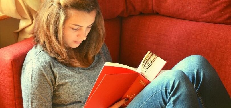 High school student studying at home.