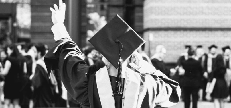 Student in graduation cap and gown