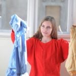 College student learning life skills like laundry.