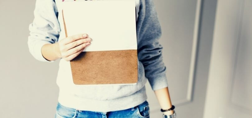 College student with checklist.