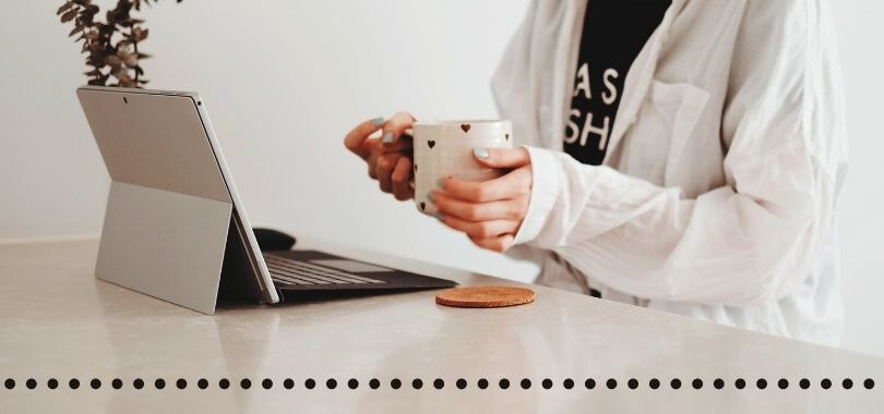 Student attending online class on her laptop.