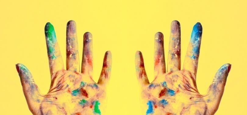 Paint covered hands.