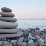 Balanced rocks on a lake