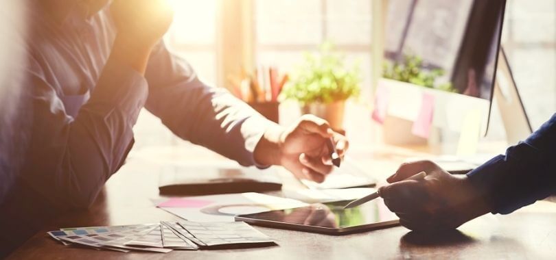 A family discussing 529 saving plans