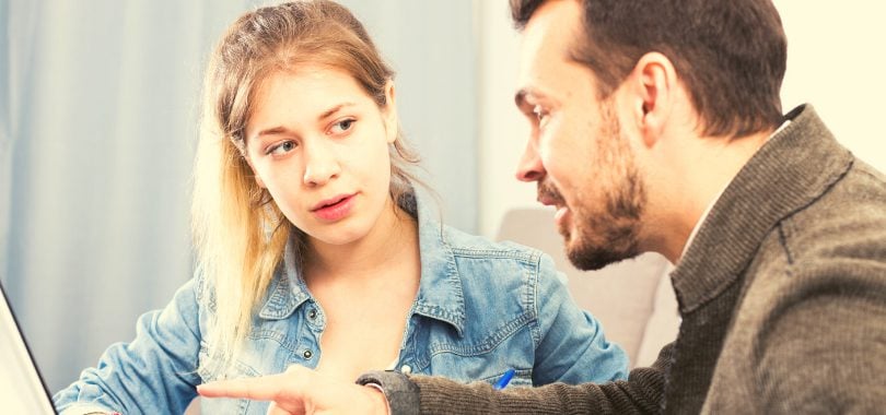 A father and daughter reviewing how 529 plan affects the FAFSA