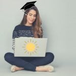 A high school student taking a college prep course on her laptop.