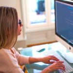 A software developer working at her computer