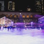 People ice skating at Rockefeller Center in winter.