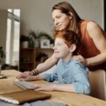 Mom and child planning for college before high school.