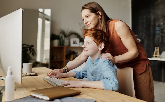 Mom and child planning for college before high school.